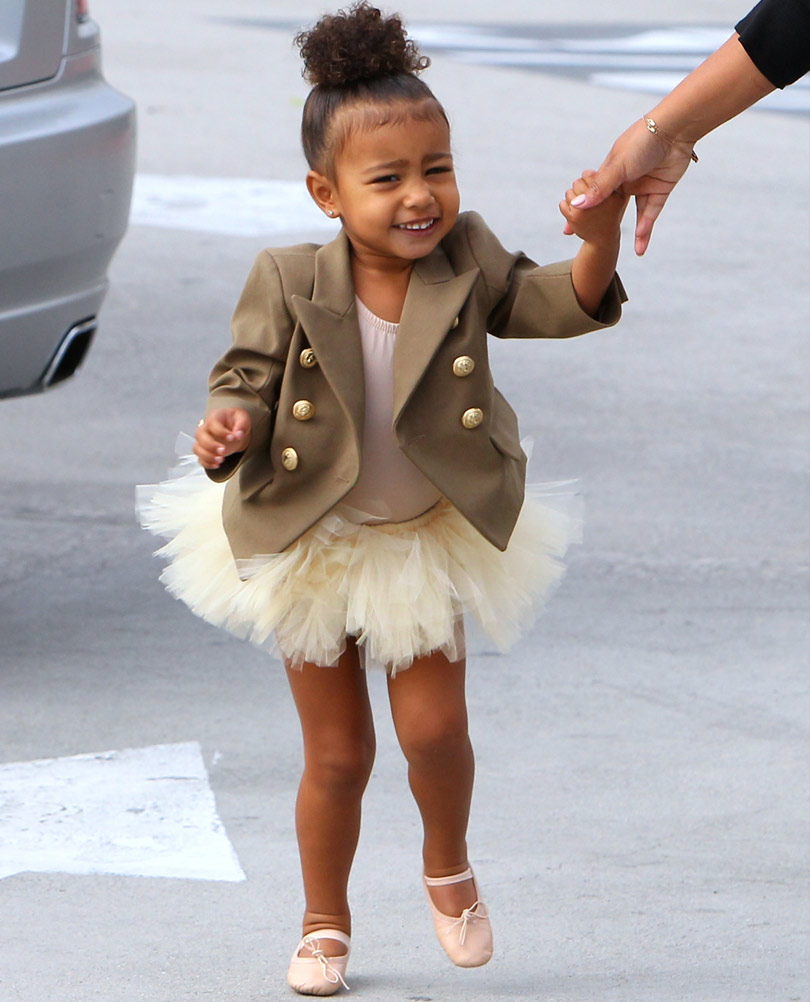 H North West με militaire custom Balmain jacket.