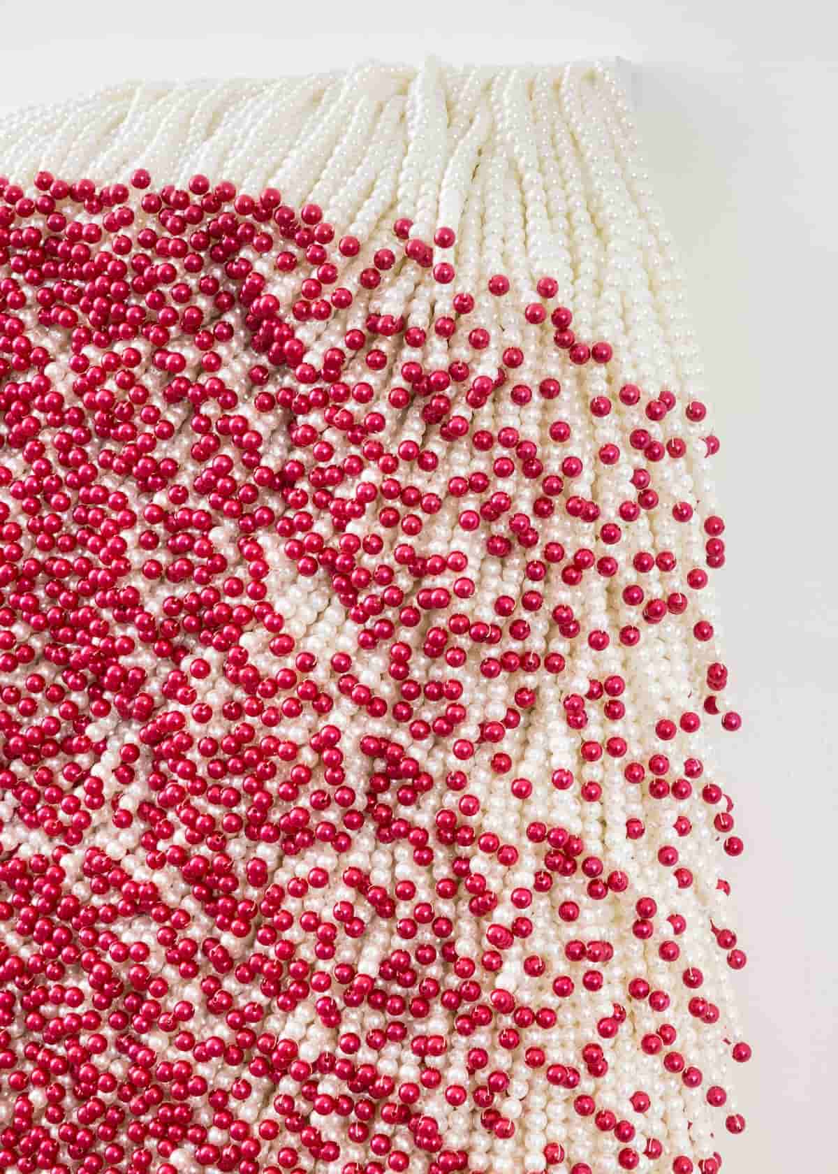 Paola Pivi, "Untitled (pearls)", 2008. Plastic pearls, wood. Photo: Andrea Rossetti