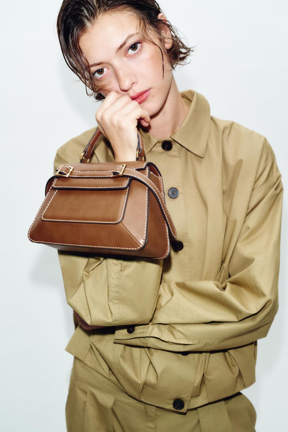 Τσάντα city με αγκράφες, 22,95€, Zara