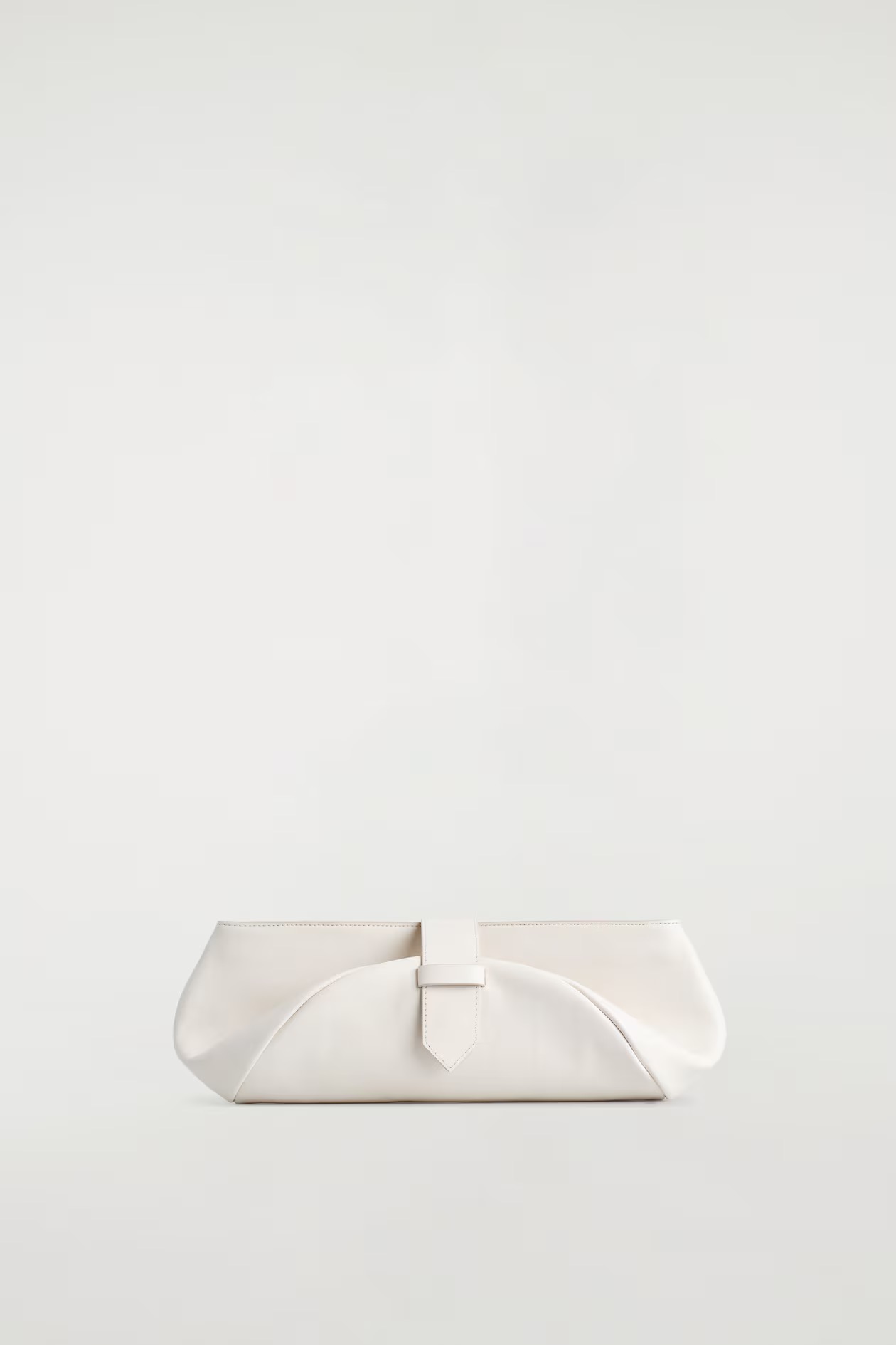 Belted clutch bag leather, 249€, COS