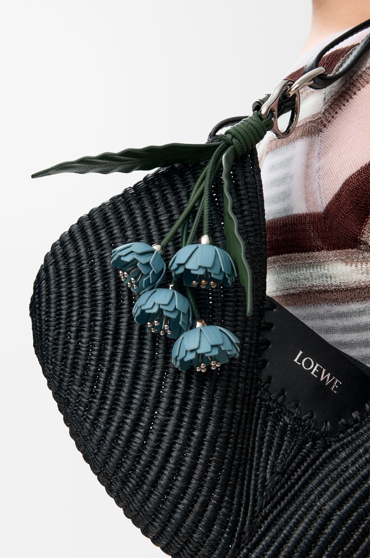 Flower charm in classic calfskin, 520€, Loewe.