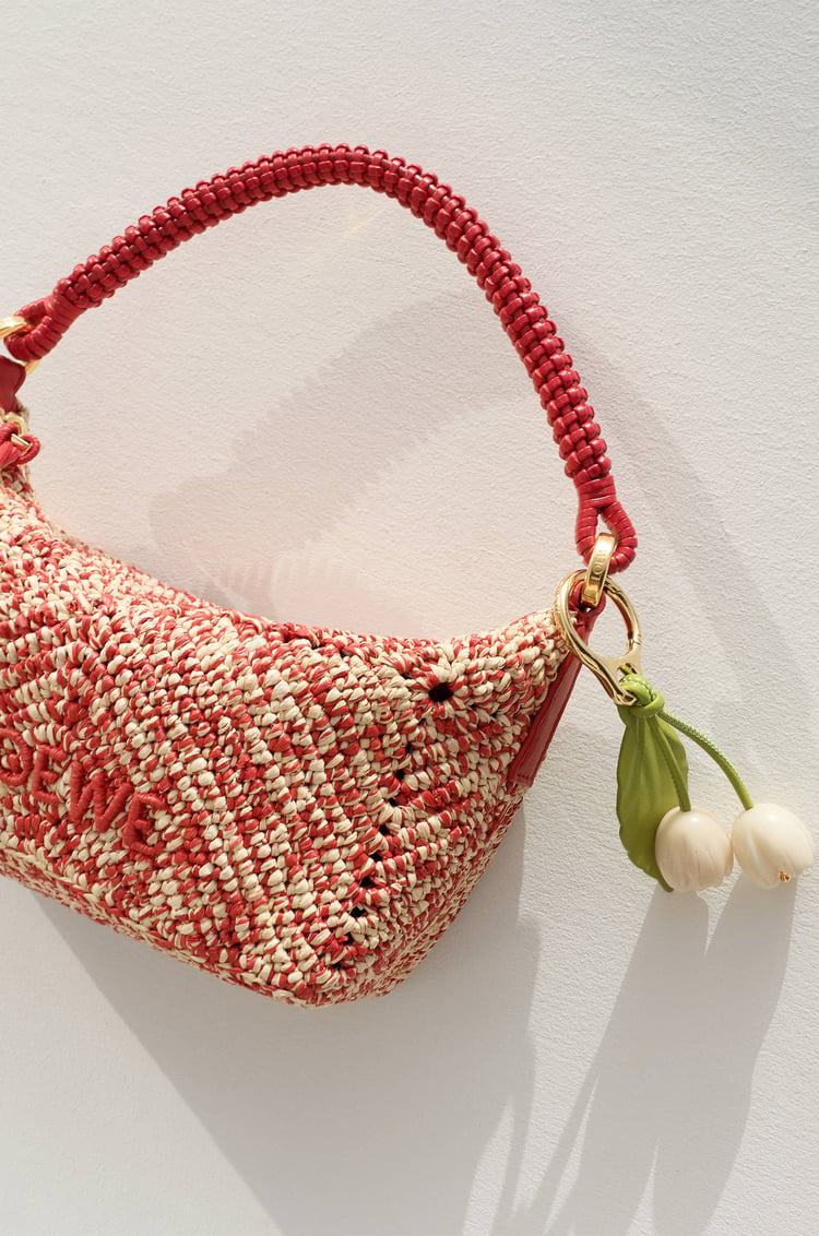 Flower charm in classic calfskin, 520€, Loewe.