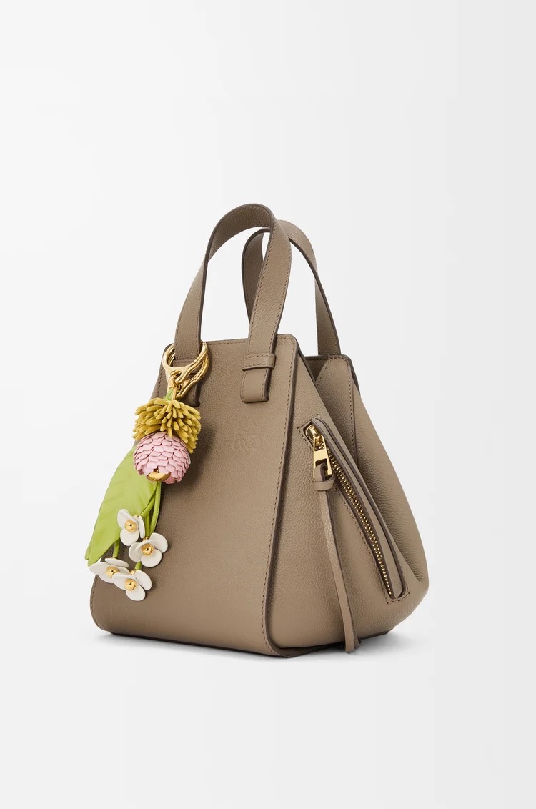 Strawberry flower charm in classic calfskin, 450€, Loewe.