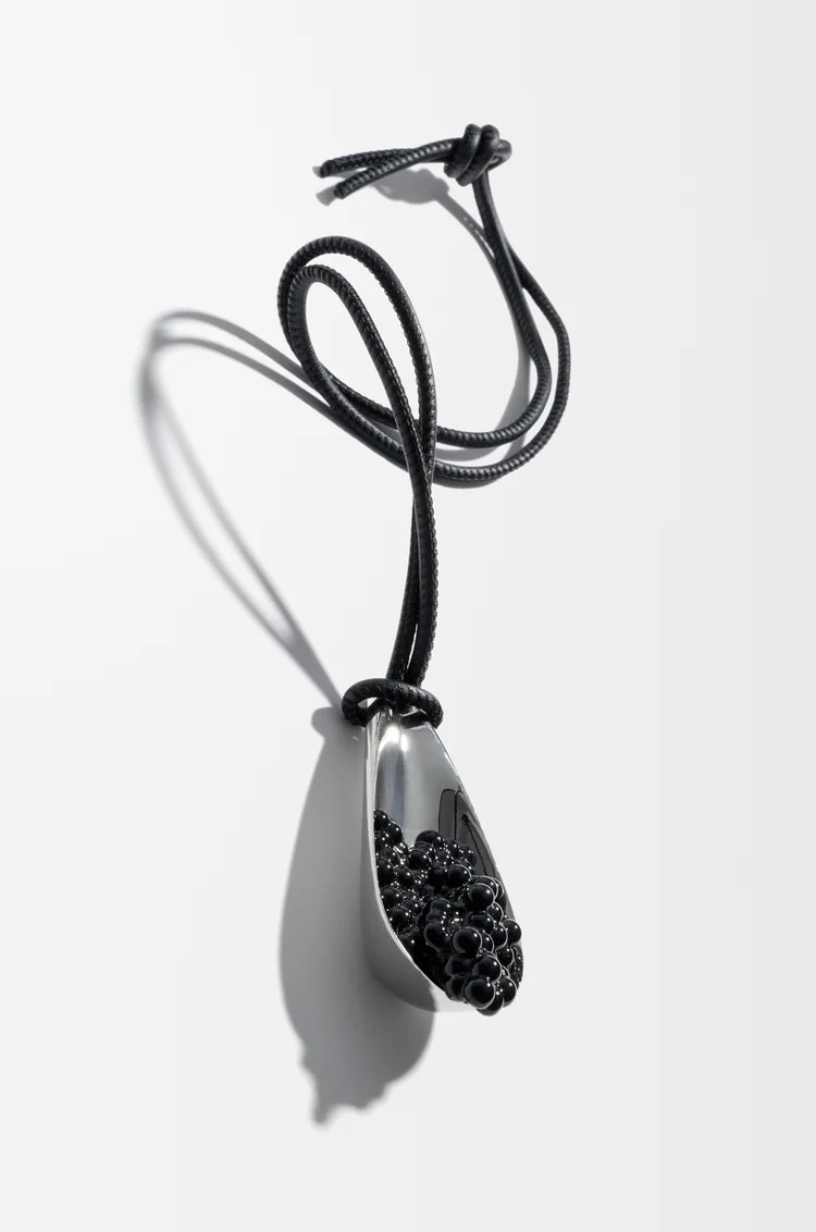 Caviar spoon charm in classic calfskin and resin, 450€, Loewe.