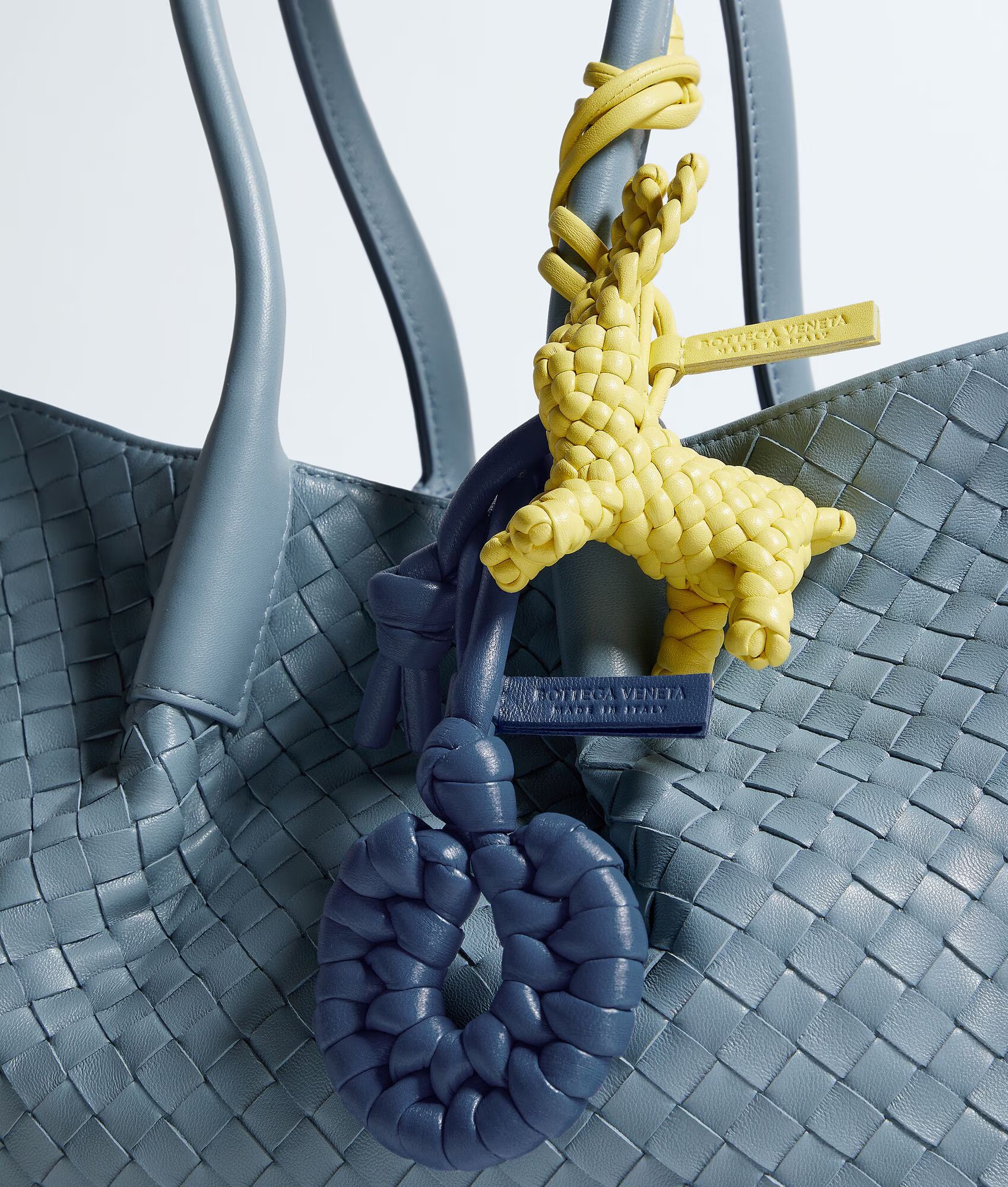 Seashell Knot Charm, 420€, Bottega Veneta & Rabbit Charm, 640€, Bottega Veneta.